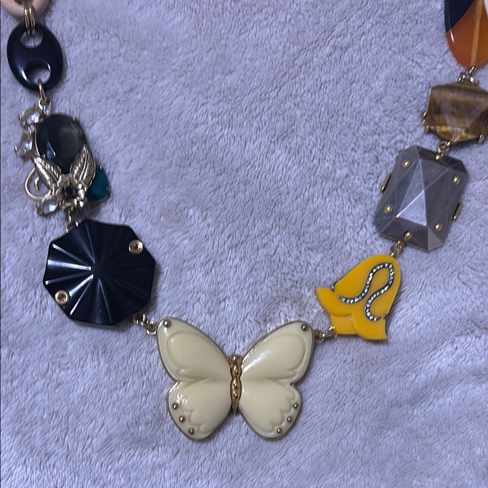Juicy Couture Rare Gold Chain Necklace W/ assorted Embellishments.